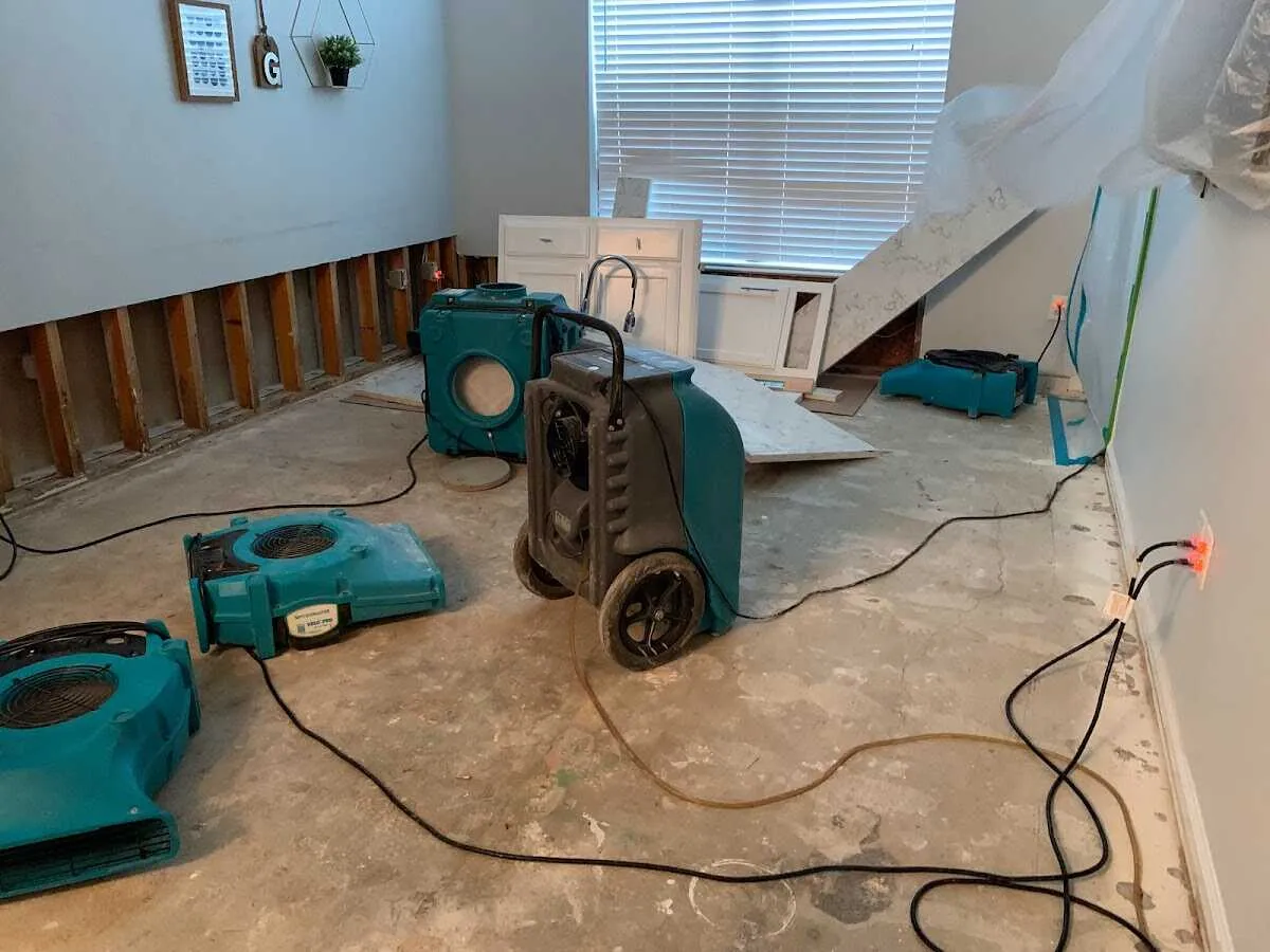 Dehumidifier in flood-cut room for Water Damage Restoration in Lakeland